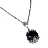 Ciondolo su kokku Semplice M onice e argento (su coccu)