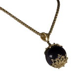 Ciondolo su kokku Semplice M onice e argento (su coccu)