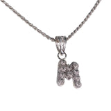 Rhodium-plated silver filigree letter pendant