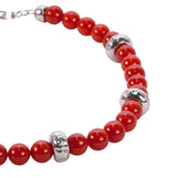 Bracciale oro bianco martellato e sfere in corallo rosso - Marina Ferraro Gioielli